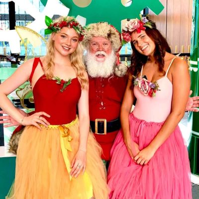 santa claus with flower fairies at Auckland Event